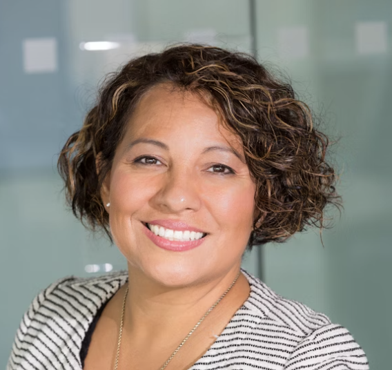 Smiling curly haired woman