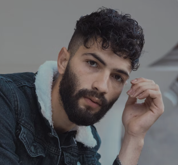 Bearded man looking away